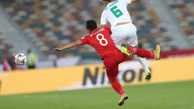 Ali Adnan, right, of Iraq in action against Nguyen Trong Hoang of Vietnam during the 2019 AFC Asian Cup group D match in Abu Dhabi. Ali Haider / EPA