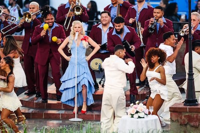 Lady Gaga performs with Puerto Rican music ensemble Los Pleneros de la Cresta and troupe Escuela de Bomba y Plena. PA