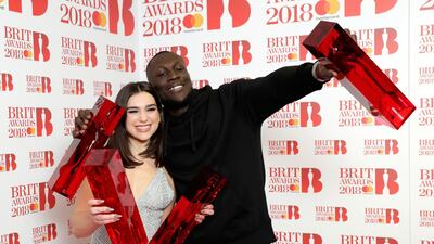 Dua Lipa, winner of the British Female Solo Artist and British Breakthrough act awards and Stormzy, winner of the British Album of the Year and British Male Solo Artist awards, pose in the winners room. John Phillips/Getty Images