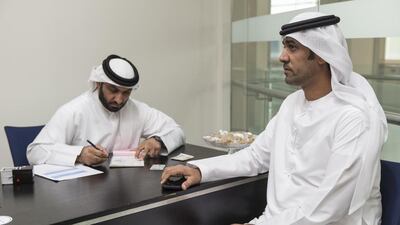 Saif Al Shaafar registers at the Dubai office on the last day as a possible FNC representative. Antonie Robertson / The National