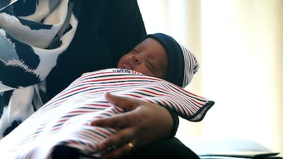 Yousif Ahmed, son of Ahmed Mohamed Yousif, was born prematurely and kept in intensive care for months, resulting in a huge bill.