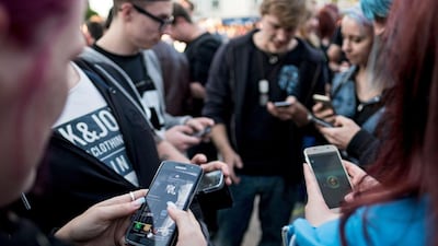 Players gather at a popular Pokemon Go location. EPA