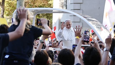 Pope Leo rides through Paris in the popemobile. AFP