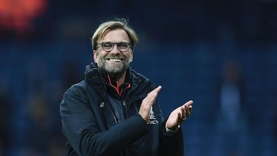 Liverpool's German manager Jurgen Klopp celebrates winning the English Premier League match against West Bromwich Albion at The Hawthorns stadium in West Bromwich, central England, on April 16, 2017. Justin Tallis / AFP