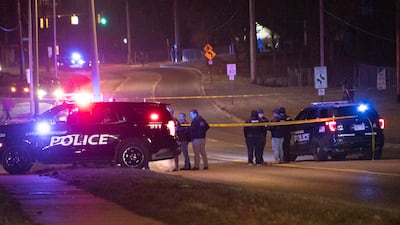 Police at the scene in East Lansing. The gunman killed himself after the shooting. AP