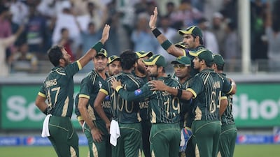 Raza Hasan, wearing No 100, may play a key role in replacing Saeed Ajmal for Pakistan. Kamran Jebreili / AP Photo