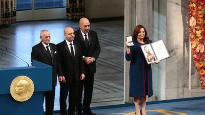 The winners of the 2015 Nobel Prize, Tunisian National Dialouge Quartet members, from left to right, Houcine Abassi, Mohamed Fadhel Mahfoudh, Abdessattar Ben Moussa and Wided Bouchamaoui, holding the award at the Nobel Peace Prize award ceremony in Oslo on December 10. AP