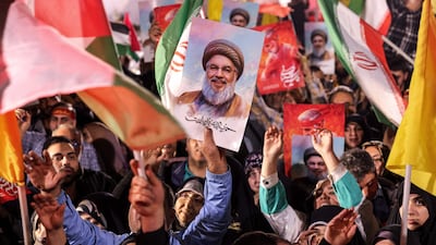 Demonstrators in Tehran celebrate Iran's strikes on Israel on Tuesday night. AFP