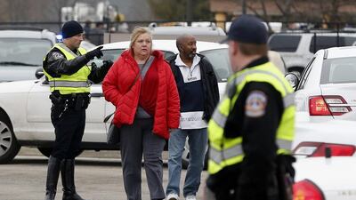 The driver and 25 students on the bus were examined by emergency responders but did not require treatment, Capt Reith said. Mykal McEldowney / The Indianapolis Star via AP