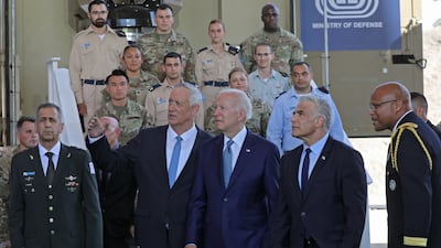 US President Joe Biden, third right, and Israeli Defence Minister Benny Gantz, second left, tour Israel's Iron Beam defence system at Ben Gurion Airport near Tel Aviv with Prime Minister Yair Lapid, second right, Israeli army Chief of Staff Aviv Kohavi, left, and US Defence Attache in Israel, Brig Gen Shawn Harris, right. EPA