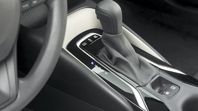 The Corolla's inner stylings are neat and tidy.