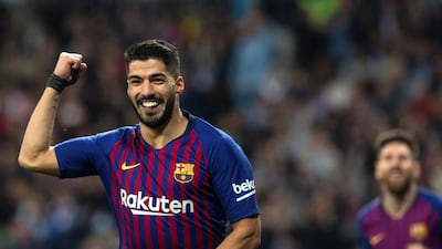 Barcelona's Luis Suarez celebrates after scoring his first goal. EPA