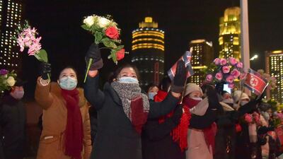 People attend a military parade celebrating the 8th Congress of the Workers' Party of Korea in Pyongyang. KCNA / AFP