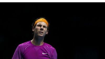 Spain's Rafael Nadal reacts during his singles match against Switzerland's Roger Federer at the ATP World Tour Finals in London.