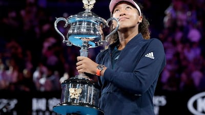 Naomi Osaka poses with the Australian Open trophy after her win over Petra Kvitova. AP Photo