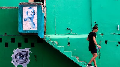 A man walks down the stairs in the neighbourhood of La Perla. Ricardo Arduengo / AFP