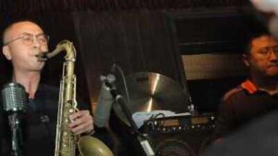 Saxophonist Liu Yuan, left, peforming at the East Shore Live Jazz in Beijing, China.