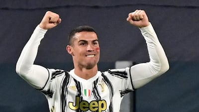 Cristiano Ronaldo celebrates after scoring his second goal against Cagliari. AFP