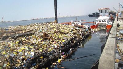 Tonnes of plastic waste are dredged from Dubai Creek every day by municipal crews. Courtesy Dubai Municipality