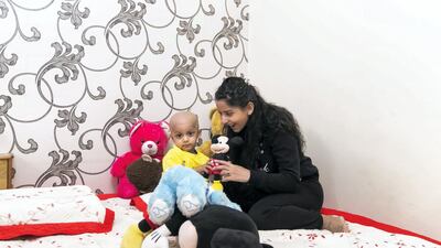 Aarev Shetty, 2, has just returned from the hospital after receiving cancer treatment. Reem Mohammed / The National