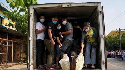 Garment factory workers and staff arrive to receive China's Sinovac coronavirus vaccine at an industrial park in Phnom Penh, Cambodia. Reuters
