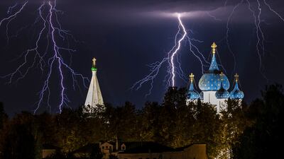 Lightning forks through the sky above the churches of Suzdal Kremlin in central Russia. Reuters