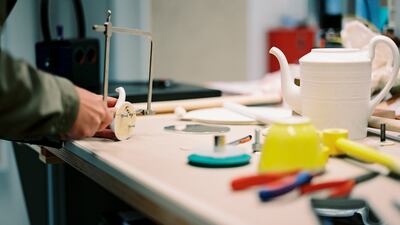 Inside the Petit H workshop, where leftover materials from other Hermes metiers are repurposed into surprising new objects. Photo: Hermes