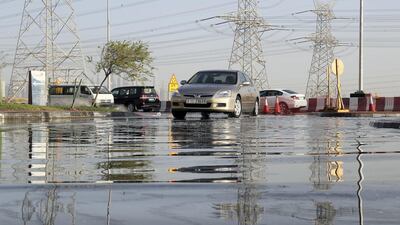 Rain at Street 8 in the Discovery Gardens area in Dubai. Pawan Singh / The National