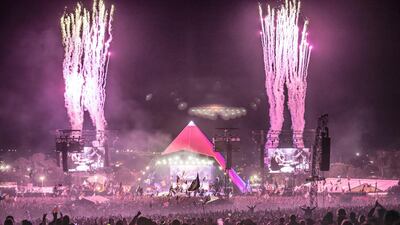 Fireworks mark the end of the Foo Fighters performance at the Glastonbury Festival in 2017. Getty Images