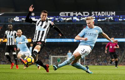 Manchester City's Oleksandr Zinchenko in action with Newcastle United's Javi Manquillo. Darren Staples / Reuters