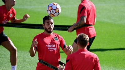 Atletico's Koke heading the ball. AFP