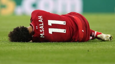 Salah after sustaining a head injury. Scott Heppell / Reuters