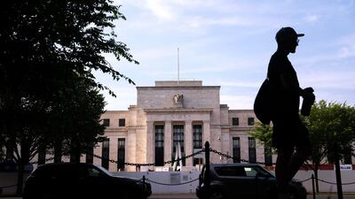 The Federal Reserve building in Washington. Wall Street ended higher on Friday on growing optimism that the Fed will finally hit the brakes on raising interest rates. Bloomberg
