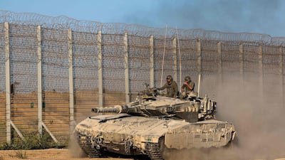 Israeli soldiers patrol the Israel-Gaza border. AFP
