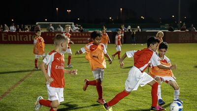 Mesut Ozil visits Arsenal Soccer School at The Sevens Stadium. Victor Besa for The National