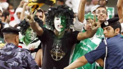 Saudi fans celebrate during the World Cup 2010 qualifying soccer against the UAE, in Abu Dhabi on Sept 10 2008.