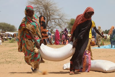 Sudanese refugees who fled the conflict in Sudan gather at the Zabout refugee Camp in Goz Beida, across the border in Chad. AP