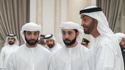 From left; Dr Sheikh Khaled bin Sultan, Dr Sheikh Hazza bin Sultan and Sheikh Mohamed bin Zayed receive mourners at Mushrif Palace.