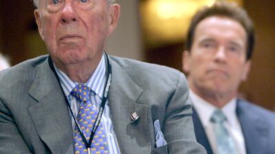 George Shultz and California Governor Arnold Schwarzenegger listen during the opening of the 26th Border Governors Conference in Los Angeles on August 14, 2008. AP