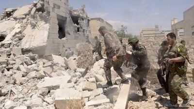 Syrian regime forces during an operation to push rebels from a road between Dahra Abd Rabbo village and Castello in Aleppo.