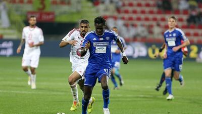 Ibrahima Toure, front, in action during the Arabian Gulf Cup final. Pawan Singh / The National