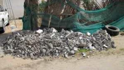 A site in Abu Dhabi where waste has been illegally dumped: the dumping is not restricted to stone, cardboard and steel. Authorities have caught people dumping sewage in the desert.