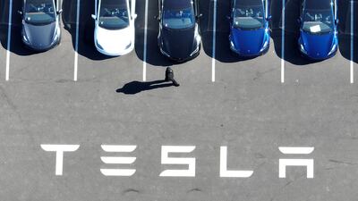 New Tesla cars sit in a car park at the Tesla factory in Fremont. Getty / AFP
