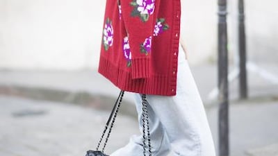 The cardigans currently in vogue aren’t fitted, flimsy numbers, but oversized, knitted and embroidered. Timur Emek / Getty Images
