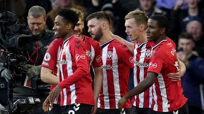 Southampton's James Ward-Prowse, second left, celebrates scoring at St Mary's Stadium. PA