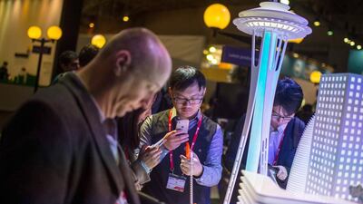 A visitor samples a Microsoft device at the Mobile World Congress. David Ramos / Getty Images