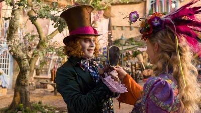 Johnny Depp, left, and Mia Wasikowska in Alice Through the Looking Glass. Peter Mountain / Disney via AP Photo