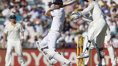 England's Alastair Cook plays a cut shot against Australia during his innings of 72 runs, his best effort in the series. Theron Kirkman / AP Photo