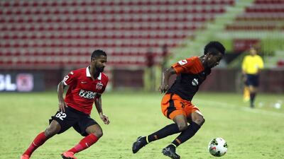 Abdulaziz Sanqour, left, is set to miss Al Ahli's Asian Champions League quarter-final. Sarah Dea / The National