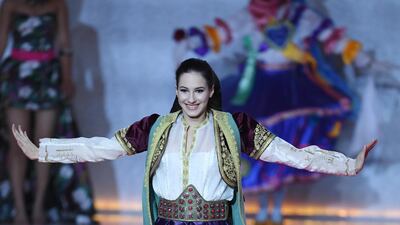 Miss Montenegro Mirjana Muratovic performs during the Miss World 2019 final in the ExCel centre in London. EPA